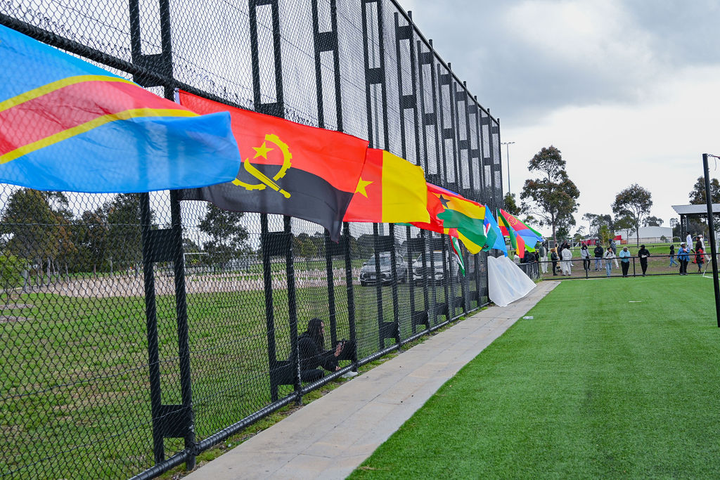 flags on fence during Kenya Stars Melbourne game day
